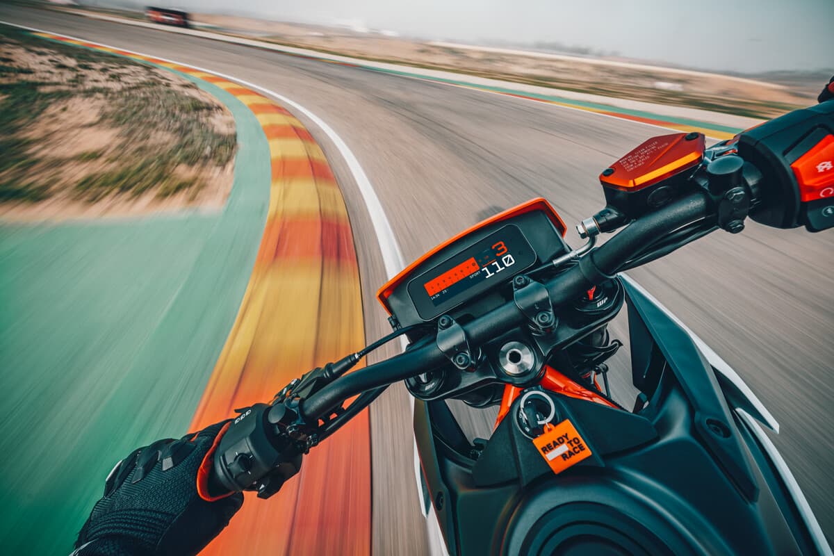 Supermoto rider pulling a wheelie